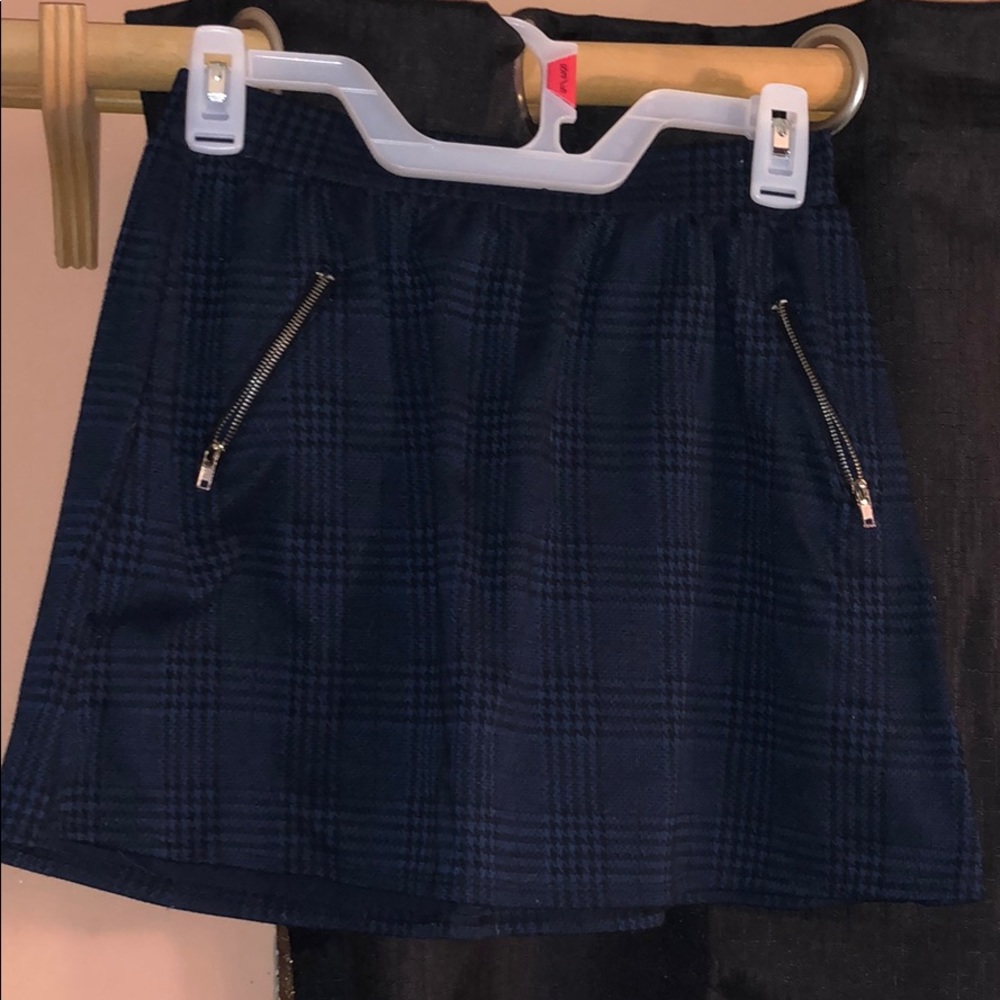 Blue and black skirt.